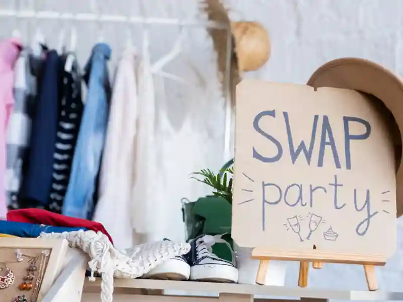 Used clothes and a sign.