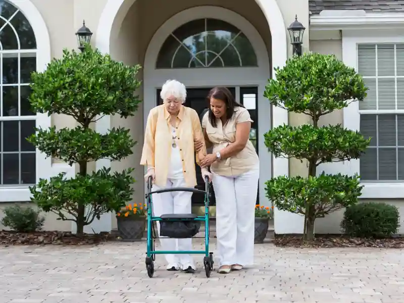 Senior woman with caregiver.