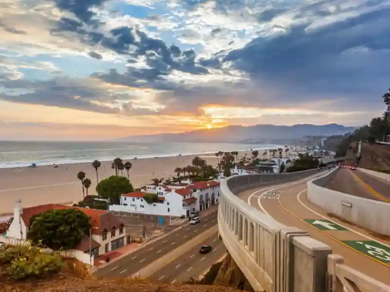 Sunset in Santa Monica, view on beach, pacific ocean and highway.