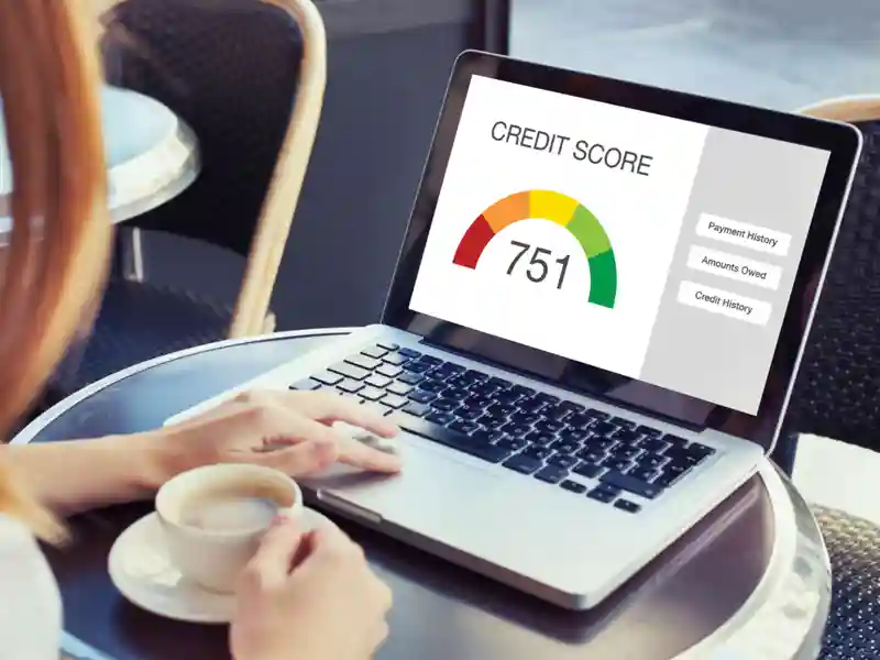 Laptop showing a credit score.