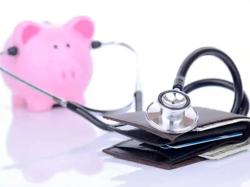 Pink piggy bank with a stethoscope and wallet