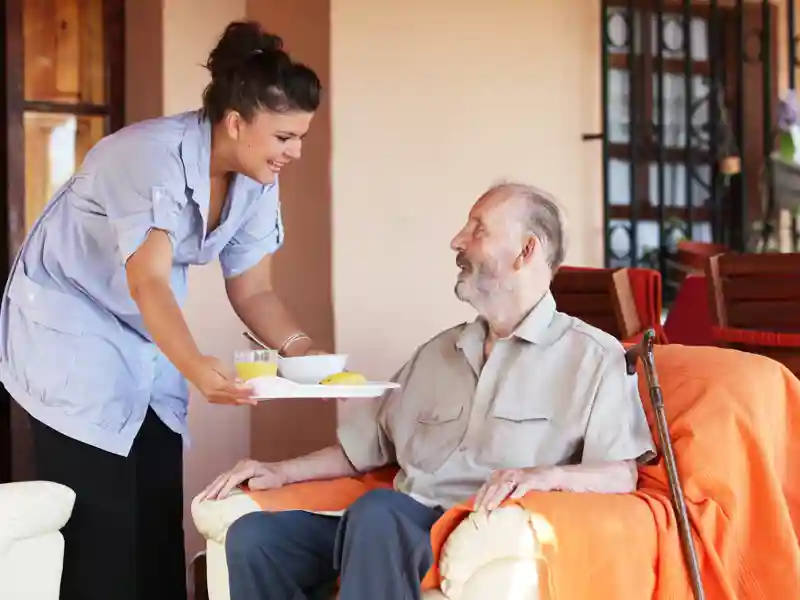 Elderly man and a nurse.